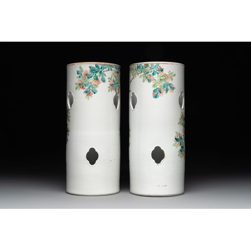 999 - A pair of Chinese famille rose hat stands with birds among flowering branches, signed Zhu Shaoquan, ... 