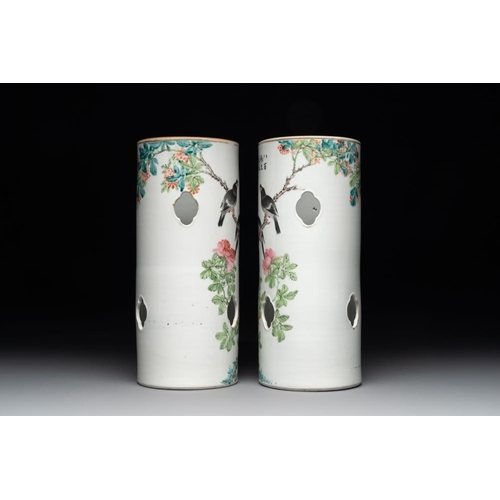 999 - A pair of Chinese famille rose hat stands with birds among flowering branches, signed Zhu Shaoquan, ... 