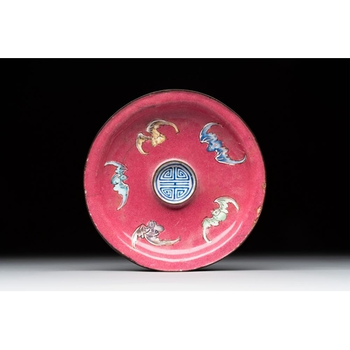 804 - A rare Canton enamel ruby-ground 'Bats and Shou' cup on stand, Qianlong mark and of the periodDia.: ... 