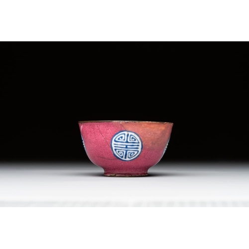 804 - A rare Canton enamel ruby-ground 'Bats and Shou' cup on stand, Qianlong mark and of the periodDia.: ... 