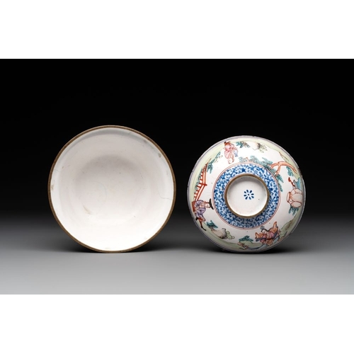 806 - A Chinese Canton enamel 'foreigners' bowl and cover and a 'erotical subject' plate, Yongzheng/Qianlo... 