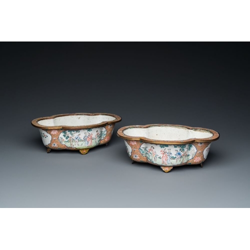 810 - A pair of Chinese Canton enamel quatrefoil jardinieres with figural design, Qianlong mark, 19th C.Di... 