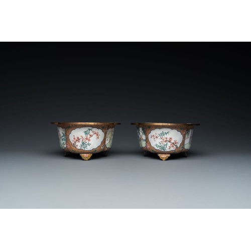 810 - A pair of Chinese Canton enamel quatrefoil jardinieres with figural design, Qianlong mark, 19th C.Di... 