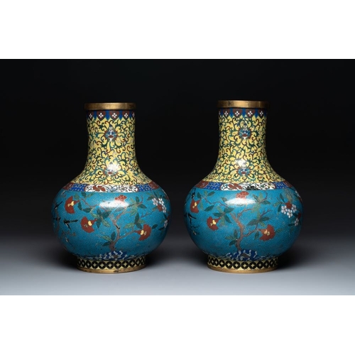 839 - A pair of large Chinese cloisonne 'magpies among flowering branches' vases, 19th C.H.: 42 cm... 