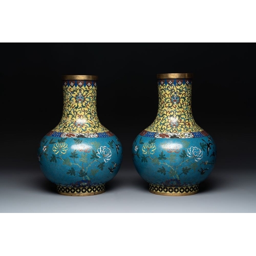 839 - A pair of large Chinese cloisonne 'magpies among flowering branches' vases, 19th C.H.: 42 cm... 