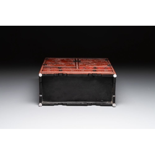 853 - A Chinese cinnabar lacquer 'mountainous landscape' cabinet, 19th C.Dim.: 38,5 x 17 x 43 cm... 