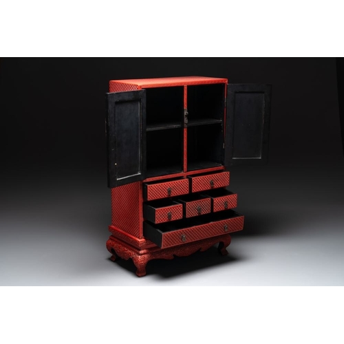 854 - A Chinese cinnabar lacquer 'mountainous landscape' cabinet on a stand, 19th C.Dim.: 44 x 24 x 70,5 c... 