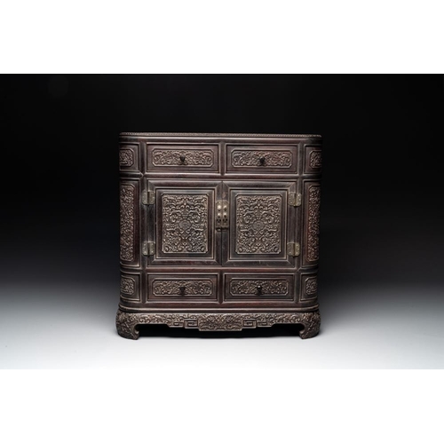 855 - A Chinese zitan wood 'duo bao ge' cabinet of curiosities with carved floral design, 19th C.Dim.: 48,... 