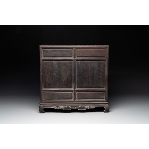 855 - A Chinese zitan wood 'duo bao ge' cabinet of curiosities with carved floral design, 19th C.Dim.: 48,... 