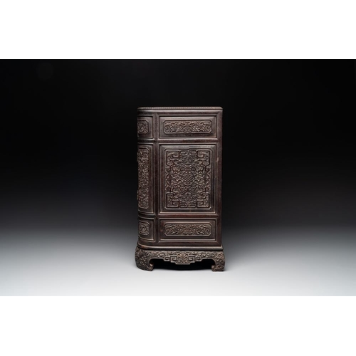 855 - A Chinese zitan wood 'duo bao ge' cabinet of curiosities with carved floral design, 19th C.Dim.: 48,... 