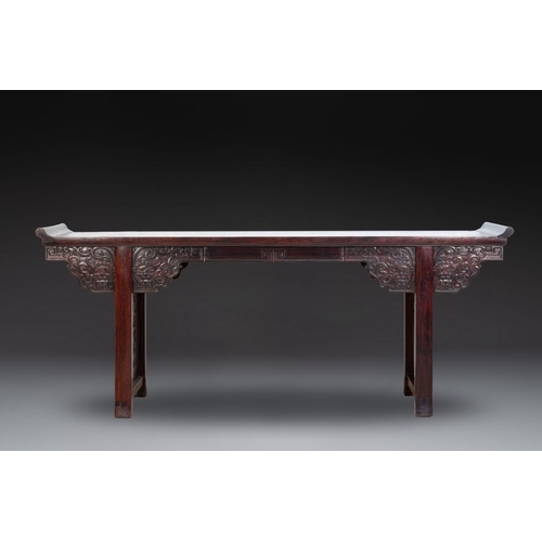 857 - A Chinese hardwood recessed-leg altar table, 'qiaotouan', 19/20th C.Dim.: 225 x 53 x 109,5 cm... 