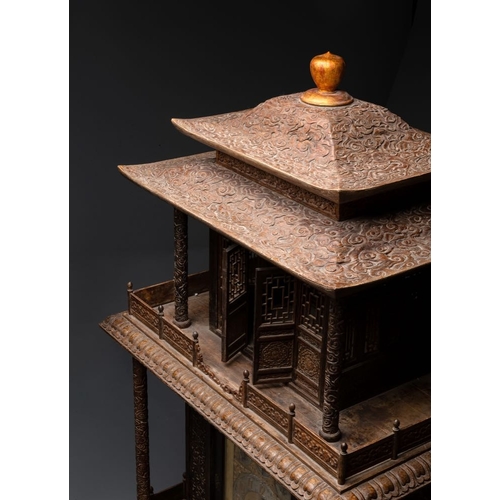 858 - A large Chinese wooden pagoda-form clock with English clock movement, 18/19th C.Dim.: 78,5 x 55,5 x ... 