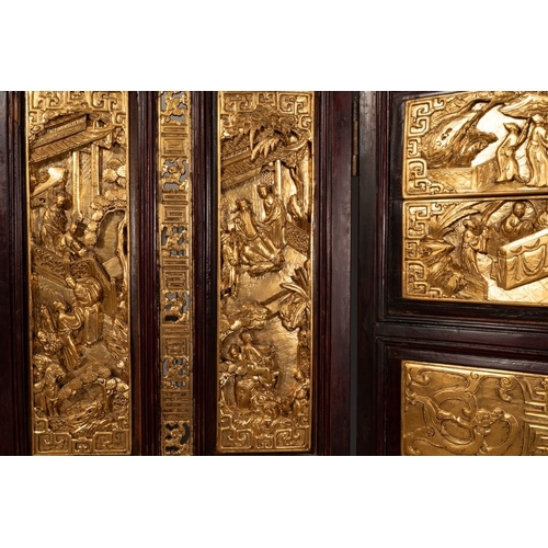 859 - A Chinese four-part reticulated and partially gilt wooden folding screen, 19th C.Dim.: 200 x 195 cm ... 