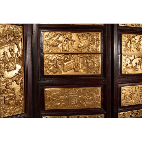 859 - A Chinese four-part reticulated and partially gilt wooden folding screen, 19th C.Dim.: 200 x 195 cm ... 