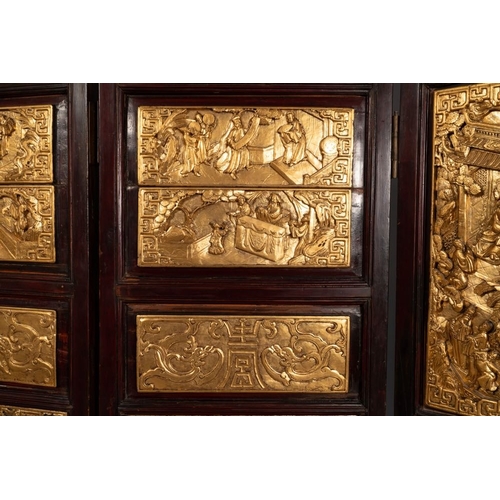 859 - A Chinese four-part reticulated and partially gilt wooden folding screen, 19th C.Dim.: 200 x 195 cm ... 