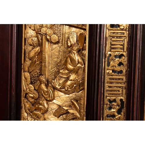 859 - A Chinese four-part reticulated and partially gilt wooden folding screen, 19th C.Dim.: 200 x 195 cm ... 