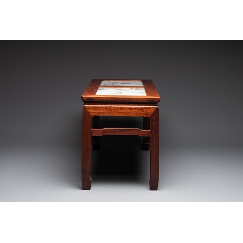 862 - A Chinese hardwood low table with two famille rose plaques, RepublicDim.: 92 x 36 x 43,5 cm (the tab... 