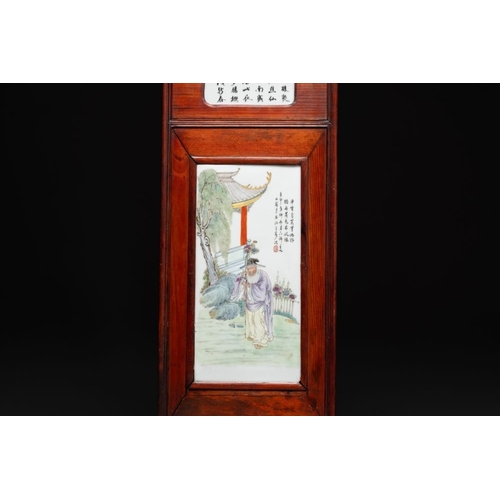 864 - A Chinese carved wooden panel with famille rose Wang Qi ç¦-style plaques, dated 1932Dim.: 113,5 x 3... 