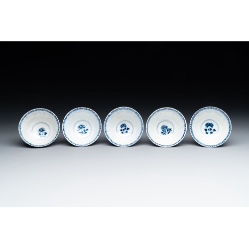 887 - Five Chinese blue and white cups and saucers with floral design, Yu  mark, KangxiDia.: 13,6 cm (the ... 