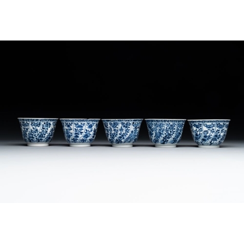 887 - Five Chinese blue and white cups and saucers with floral design, Yu  mark, KangxiDia.: 13,6 cm (the ... 