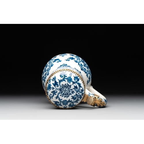 1004 - A fine blue and white Dutch Delft gilt-silver-mounted ewer and cover in the style of Daniel Marot, c... 