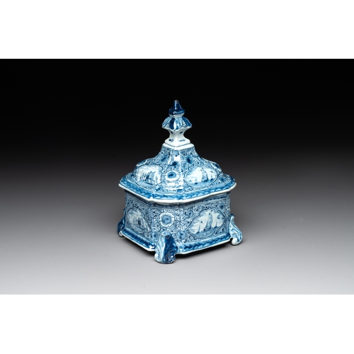 1005 - A blue and white Dutch Delft tobacco box and cover, 18th C.Dim.: 12,3 x 12,3 x 17,2 cm (the box and ... 