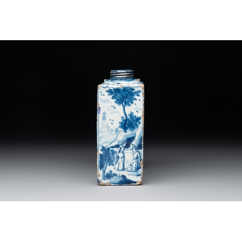 1008 - A blue and white Dutch Delft tea caddy with narrative design, early 18th C.H.: 14 cm 
Marked PK on t... 