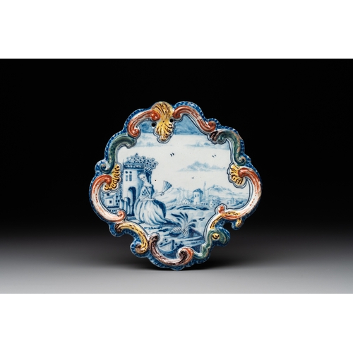 1016 - A polychrome Dutch Delft 'pastoral' plaque, 18th C.Dim.: 17 x 17 cm