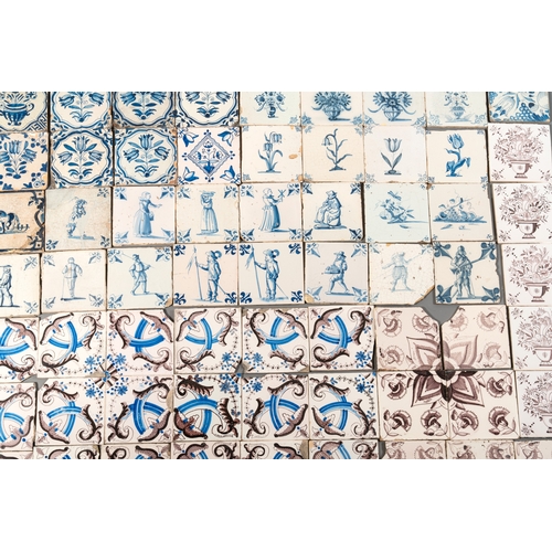 1076 - 90 manganese, blue and white Dutch Delft tiles, 17/18th C.Dim.: ca. 13 x 13 x 0,7 cm