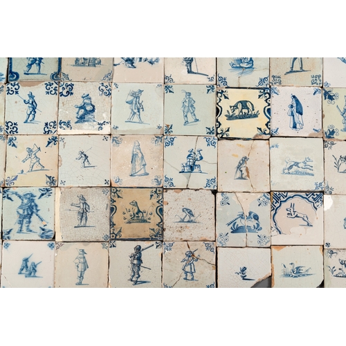 1077 - 105 polychrome, blue and white Dutch Delft tiles with figures, flowers and animals, 17/18th C.Dim.: ... 