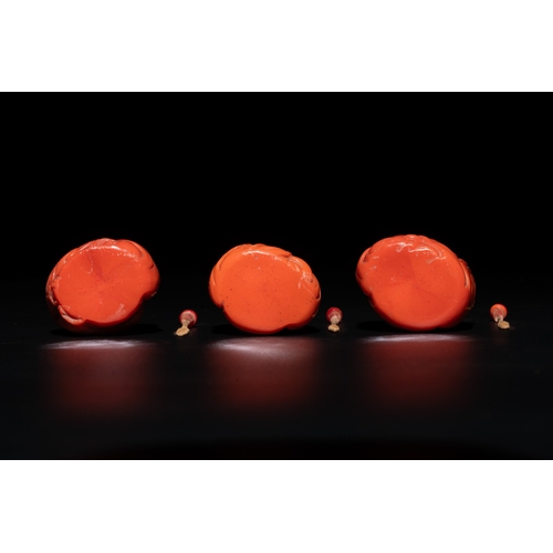 12 - A set of ten Chinese coral-red glass Luohan-form snuff bottles, 20th C.H.: 7,1 cm (the tallest) H.: ... 