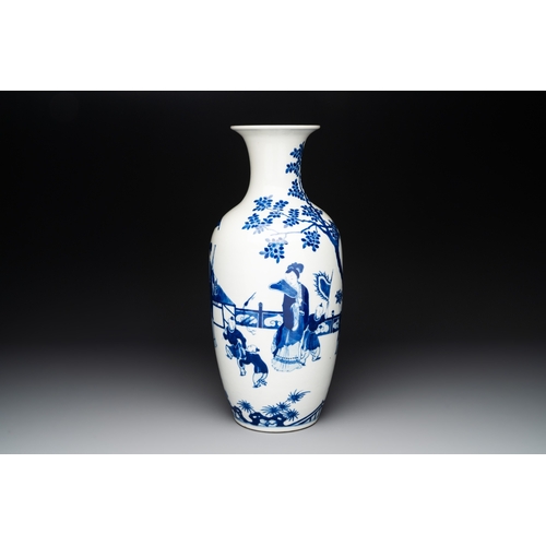 133 - A Chinese blue and white vase with ladies and playing boys in a garden, 19th C.H.: 45 cm... 