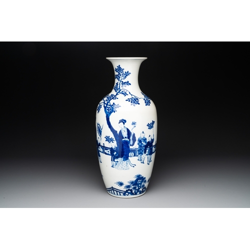 133 - A Chinese blue and white vase with ladies and playing boys in a garden, 19th C.H.: 45 cm... 