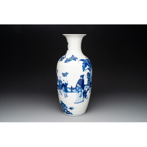 133 - A Chinese blue and white vase with ladies and playing boys in a garden, 19th C.H.: 45 cm... 