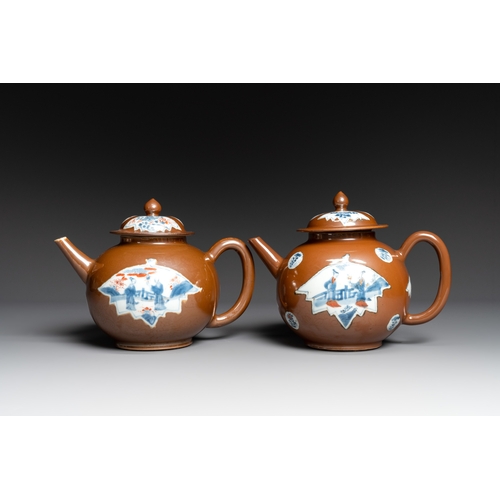 144 - A pair of large Chinese Imari-style capucin-brown-ground teapots and two famille rose chocolate pots... 