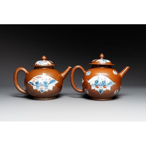 144 - A pair of large Chinese Imari-style capucin-brown-ground teapots and two famille rose chocolate pots... 