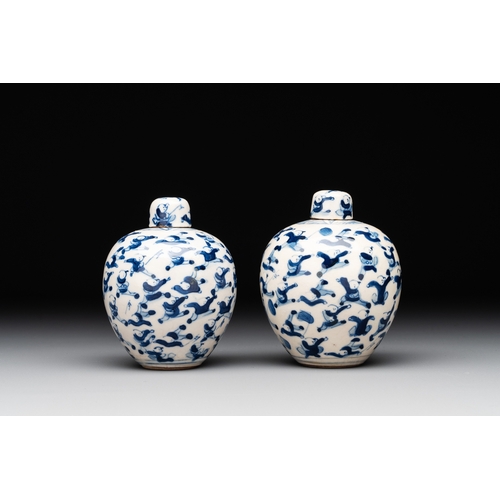 21 - A pair of Chinese blue and white soft paste '100 boys' covered jarlets and a seal paste box, Kangxi ... 