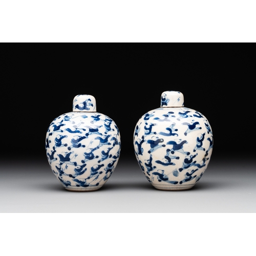 21 - A pair of Chinese blue and white soft paste '100 boys' covered jarlets and a seal paste box, Kangxi ... 