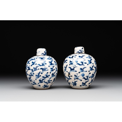 21 - A pair of Chinese blue and white soft paste '100 boys' covered jarlets and a seal paste box, Kangxi ... 