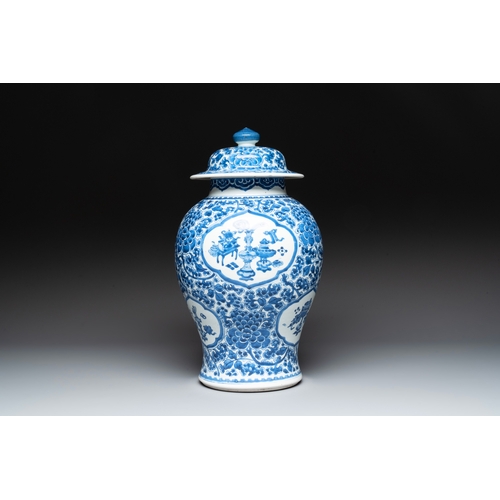 281 - A Chinese blue and white 'antiquities and peony scrolls' vase and cover, KangxiH.: 45 cm (incl. cove... 