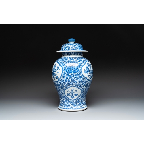 281 - A Chinese blue and white 'antiquities and peony scrolls' vase and cover, KangxiH.: 45 cm (incl. cove... 