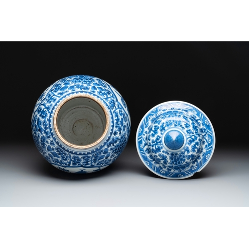 281 - A Chinese blue and white 'antiquities and peony scrolls' vase and cover, KangxiH.: 45 cm (incl. cove... 