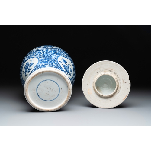 281 - A Chinese blue and white 'antiquities and peony scrolls' vase and cover, KangxiH.: 45 cm (incl. cove... 