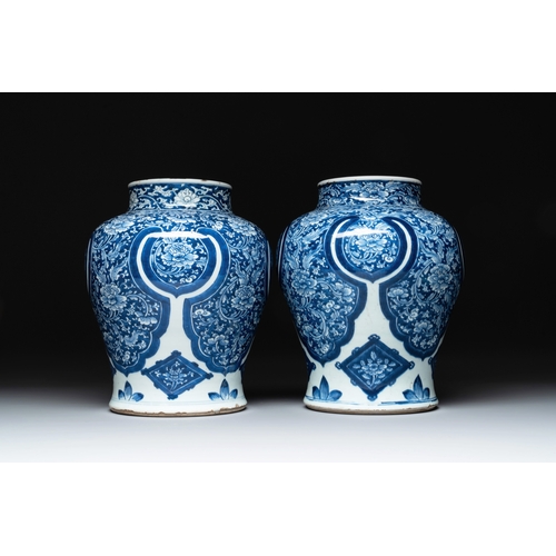 284 - A pair of Chinese blue and white 'peony scroll' vases, KangxiH.: 30,5 cm