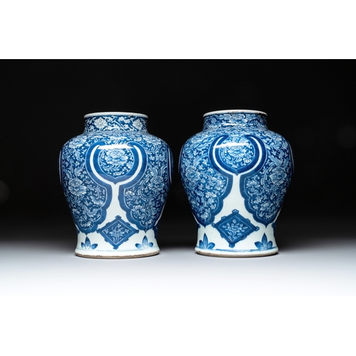 284 - A pair of Chinese blue and white 'peony scroll' vases, KangxiH.: 30,5 cm