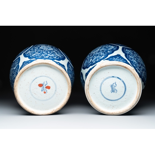 284 - A pair of Chinese blue and white 'peony scroll' vases, KangxiH.: 30,5 cm