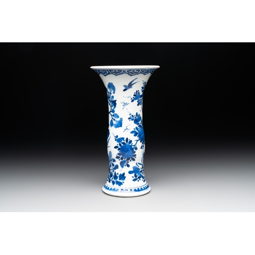 285 - A Chinese blue and white 'gu' vase with birds amongst flowering branches, KangxiH.: 24,5 cm... 