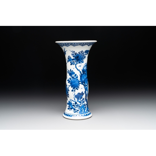 285 - A Chinese blue and white 'gu' vase with birds amongst flowering branches, KangxiH.: 24,5 cm... 