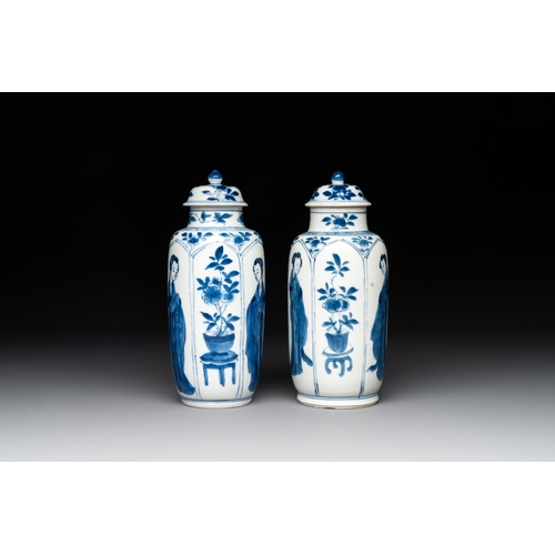 291 - A pair of Chinese blue and white 'Long Eliza' vases and covers, jade mark, KangxiH.: 19 cm (incl. co... 