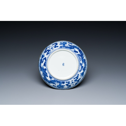 438 - A Chinese blue and white 'Bleu de Hue' plate for the Vietnamese market, Nhat mark for the Minh Mang ... 